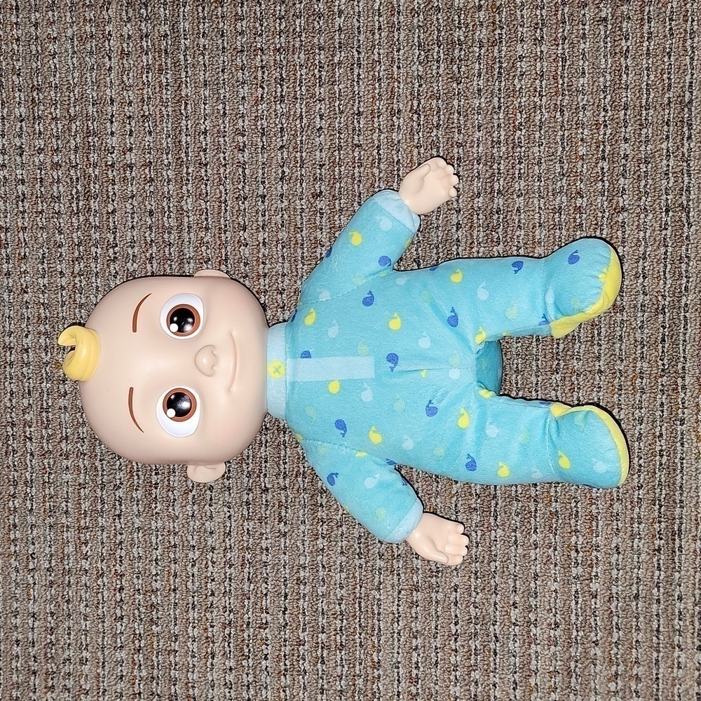 JJ Cocomelon 8" doll. He sings and talks   in great condition